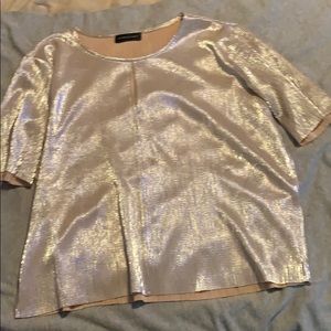 Metallic gold short sleeve top.